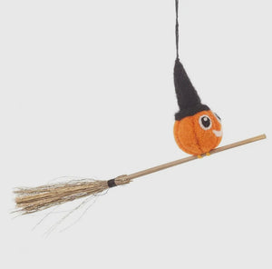 Fairtrade wool pumpkin on broom decoration