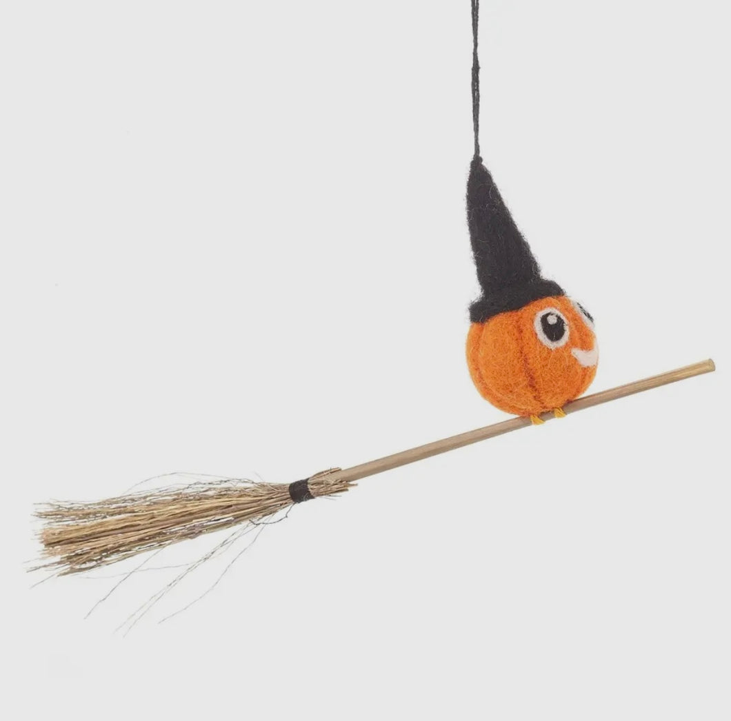 Fairtrade wool pumpkin on broom decoration